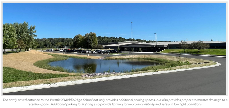 The newly paved entrance to the MS/HS not only provides additional parking spaces, but also provides proper stormwater drainage to a retention pond. Additional parking lot lighting improves visibility and safety in low light conditions.