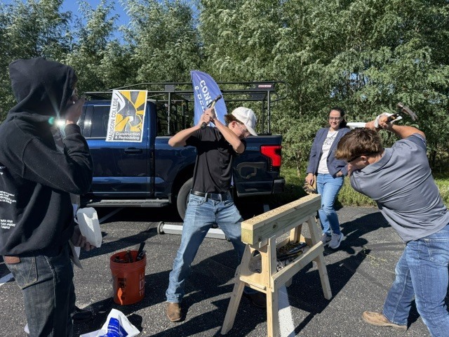 Students hammering nails