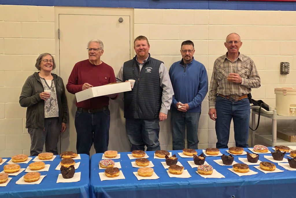 School Board members serving Pastries with Parents