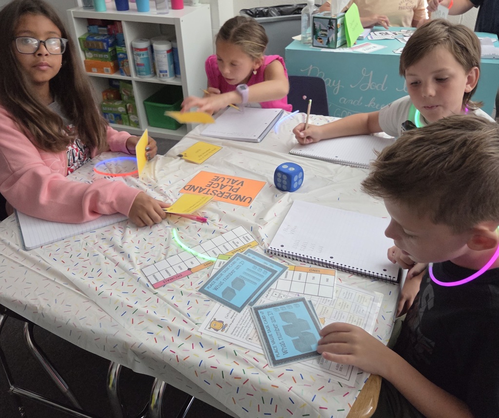 Fourth Grade reviewing place value with a Place Value Party!