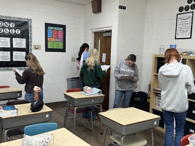 Algebra students are learning about solving quadratic equations. They had fun reviewing with a scavenger hunt.