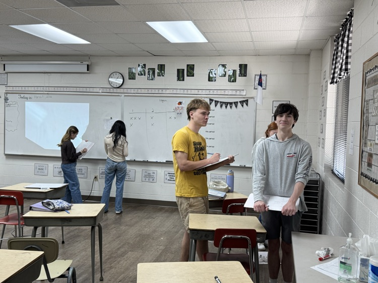 Algebra student are learning about quadratic equations. They had fun reviewing with a scavenger hunt.