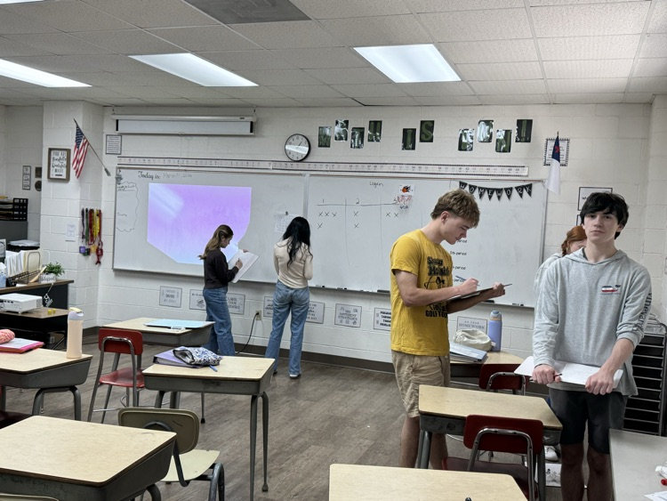 Algebra student are learning about quadratic equations. They had fun reviewing with a scavenger hunt.