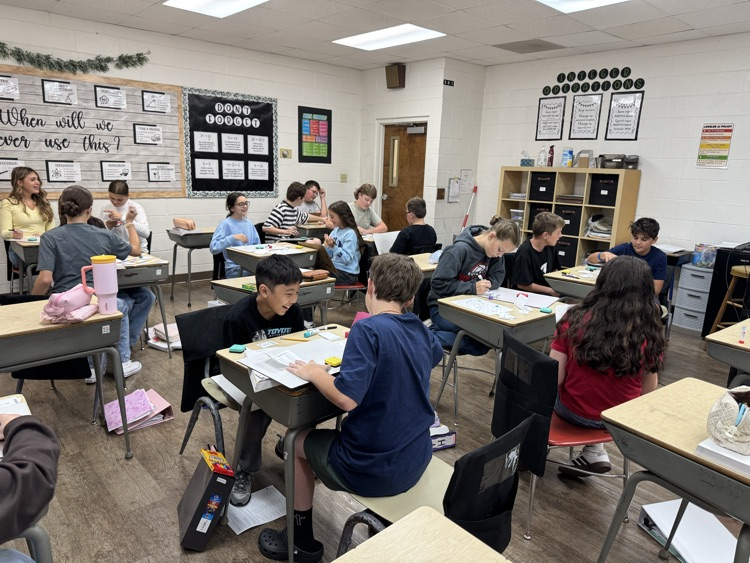 Pre Algebra students are having fun reviewing adding and subtracting positive and negative numbers with a board game!