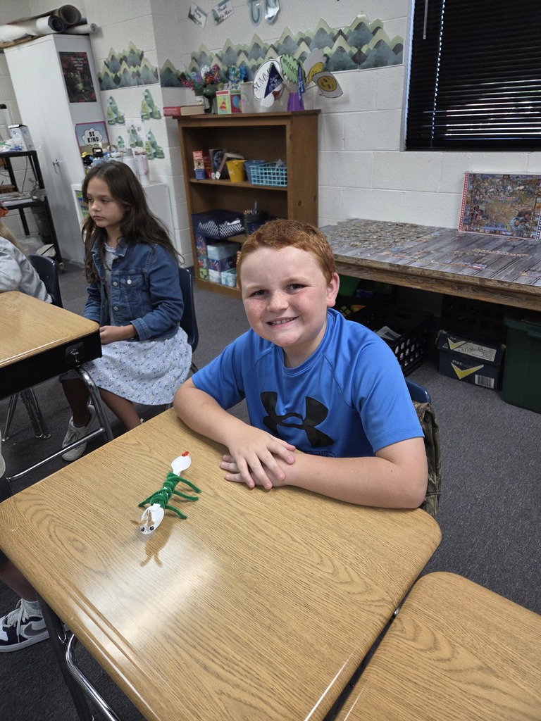 4th grade showing off their arthrods in science.