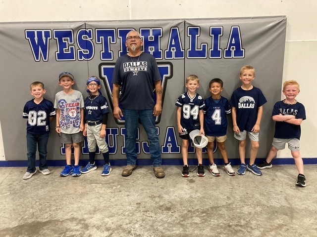Mr. Leo and students in Dallas Cowboy gear