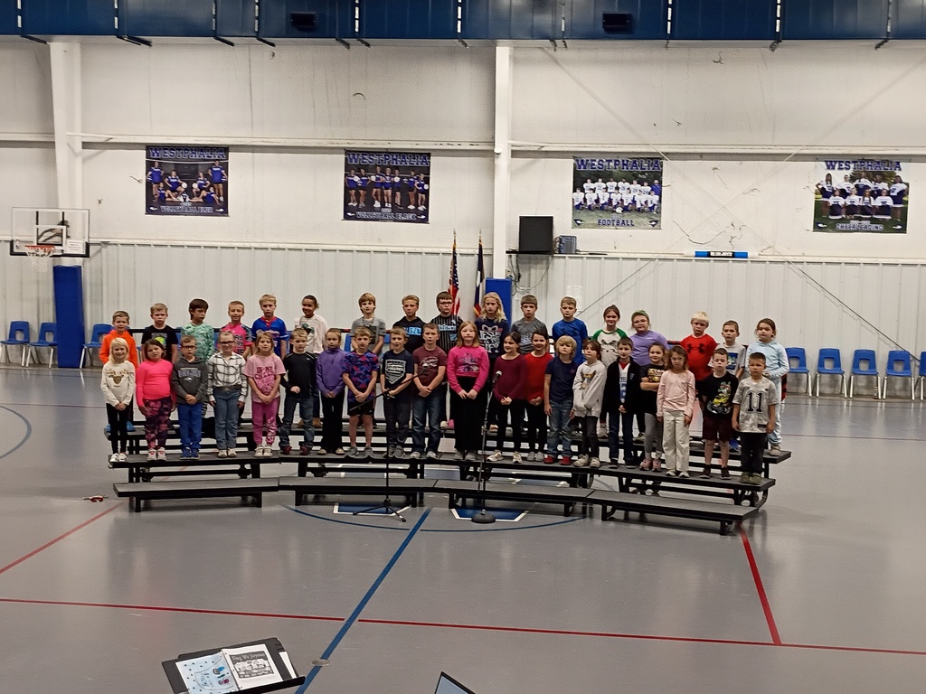 2nd and 3rd Grade practicing for the Christmas concert.