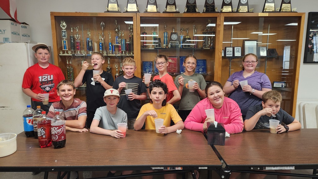 Students pose with ice cream floats for winning the junior high keyboarding competition