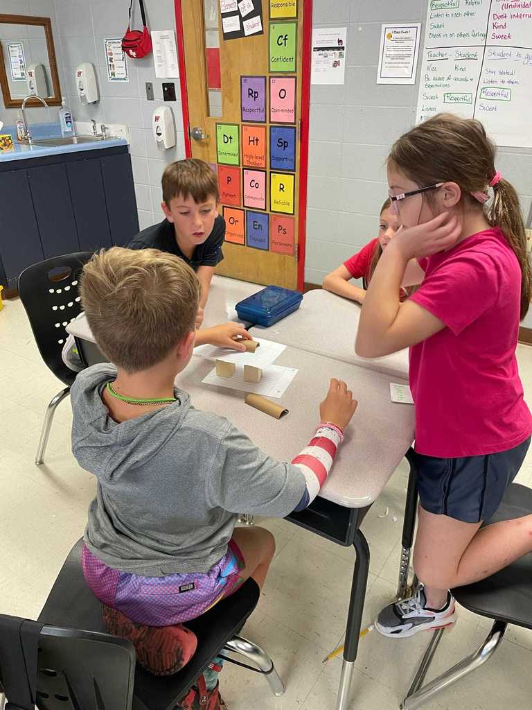 Ms. Russell's 3rd graders showed off their teamwork and problem-solving this week in a bridge-building challenge!   Each group worked together to try out ideas, pick the best design, and then put their bridge to the test with pennies.  Teamwork, problem-solving, and creativity — that’s what makes our Lil Warriors shine! ❤️🤍
