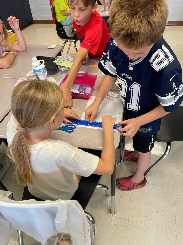 Ms. Russell's 3rd graders showed off their teamwork and problem-solving this week in a bridge-building challenge!   Each group worked together to try out ideas, pick the best design, and then put their bridge to the test with pennies.  Teamwork, problem-solving, and creativity — that’s what makes our Lil Warriors shine! ❤️🤍