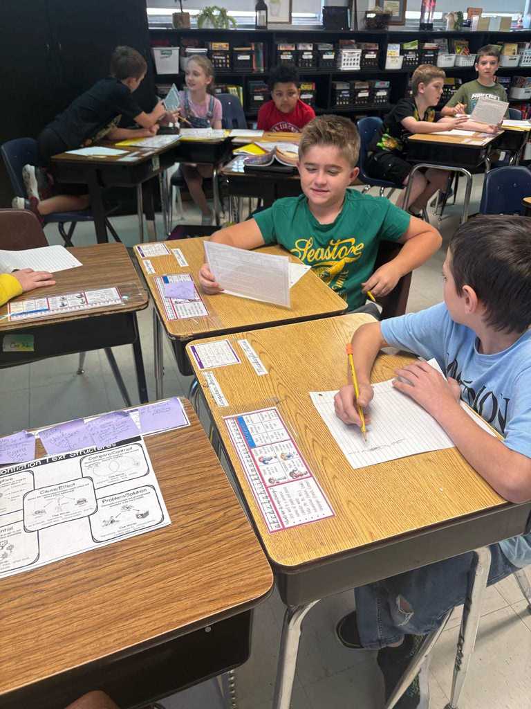 Ms. Cox’s 4th grade literacy students took part in a gallery walk around the classroom, reading short nonfiction passages and responding to the text. 📚✨  Working together, they collaborated to identify the text structure of each passage—building comprehension skills while engaging in teamwork and discussion.