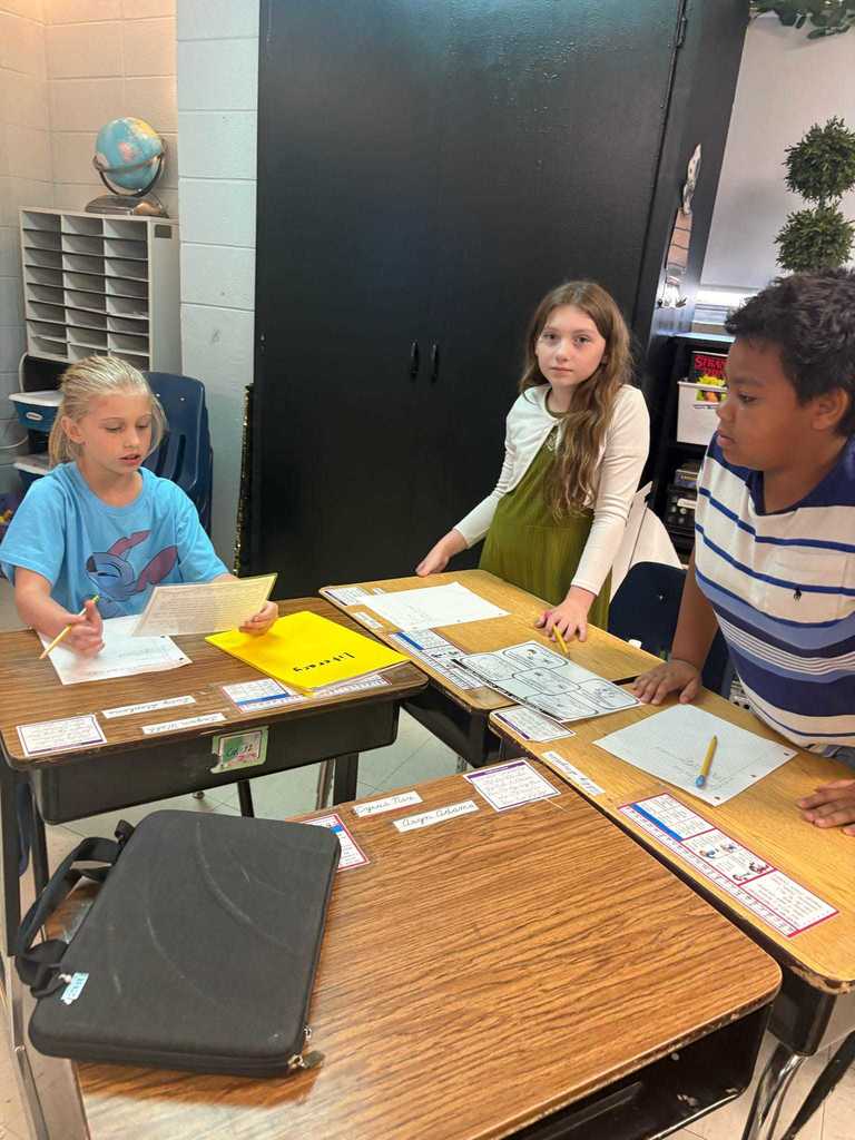 Ms. Cox’s 4th grade literacy students took part in a gallery walk around the classroom, reading short nonfiction passages and responding to the text. 📚✨  Working together, they collaborated to identify the text structure of each passage—building comprehension skills while engaging in teamwork and discussion.