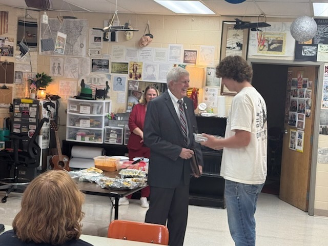 Westside High School was proud to welcome State Representative Dwight Tosh today. He spent time in a couple of classrooms and took questions from our students.  His first stop was Coach Brown’s Civics class, where students were discussing the United States Constitution. Representative Tosh shared how his work in the Arkansas Legislature connects to protecting and upholding the Constitution, giving students a real-world look at what they’ve been studying.  He then visited Mr. Miller’s U.S. History class, where students have been learning about the Great Depression. As part of their project, they prepared Depression-era foods and invited Representative Tosh to try some of their dishes. He was a good sport and sampled several while talking with the class.  Our students asked thoughtful questions and represented Westside well. We appreciate Representative Tosh for taking the time to visit and spend part of his day with us.