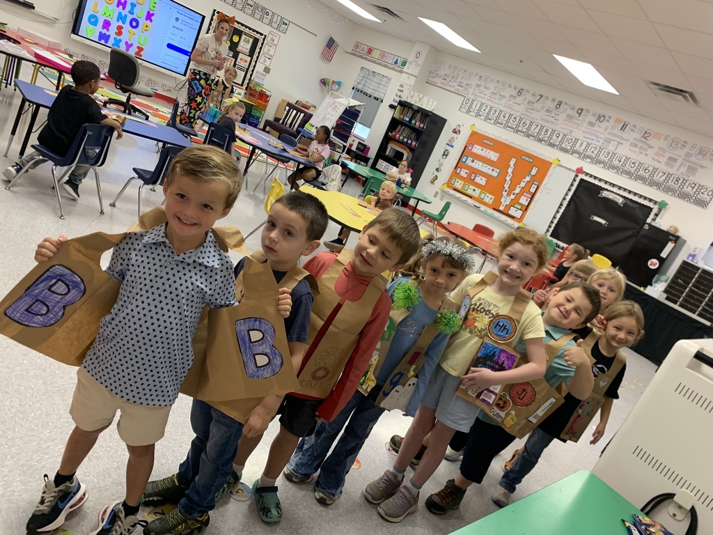 Our amazing WES Kindergarten students have officially completed ABC Bootcamp — learning a letter a day for 26 days! 🙌🙌  Today, they celebrated with a fun ABC Parade, proudly walking the halls in vests they designed, each decorated with a different letter. ❤️🤍  Since our kindergarten teachers began this special bootcamp three years ago, our student data has grown by leaps and bounds — and today was a perfect reminder of how exciting learning can be! ✨💪   Missed the parade? You can still catch the fun on our Facebook Live video from this morning!  Way to go, Lil' Warriors! 👏👏