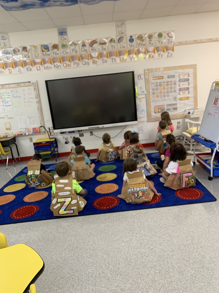 Our amazing WES Kindergarten students have officially completed ABC Bootcamp — learning a letter a day for 26 days! 🙌🙌  Today, they celebrated with a fun ABC Parade, proudly walking the halls in vests they designed, each decorated with a different letter. ❤️🤍  Since our kindergarten teachers began this special bootcamp three years ago, our student data has grown by leaps and bounds — and today was a perfect reminder of how exciting learning can be! ✨💪   Missed the parade? You can still catch the fun on our Facebook Live video from this morning!  Way to go, Lil' Warriors! 👏👏