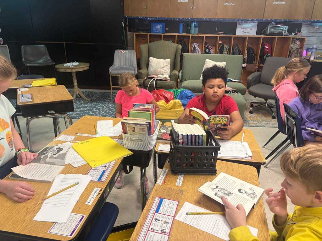 WES 4th graders in Ms. Cox’s reading classes visited the Class Café to “taste test” different genres of books! Students sampled stories, shared their favorites, decorated placemats, and even ended with a sweet cupcake treat.  Such a fun way to spark a love for reading! ❤️🤍