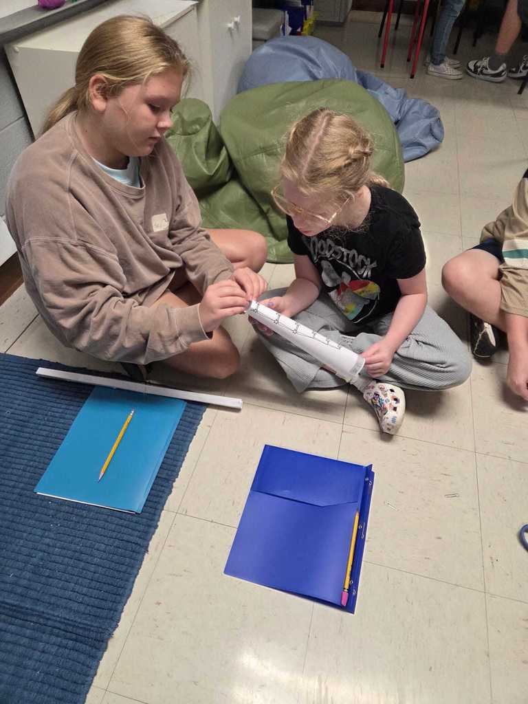 Mrs. Wilson’s 4th grade class turned the classroom into a mini theme park today as students designed and tested their own roller coaster tracks!     The challenge: demonstrate the transfer of energy by releasing a marble at different heights to see how it impacts where the “bumper car” lands.  Warriors discover how energy works in the real world.  ❤️🤍