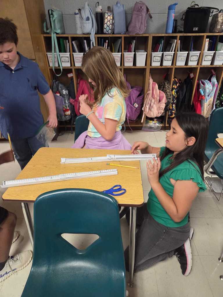 Mrs. Wilson’s 4th grade class turned the classroom into a mini theme park today as students designed and tested their own roller coaster tracks!     The challenge: demonstrate the transfer of energy by releasing a marble at different heights to see how it impacts where the “bumper car” lands.  Warriors discover how energy works in the real world.  ❤️🤍