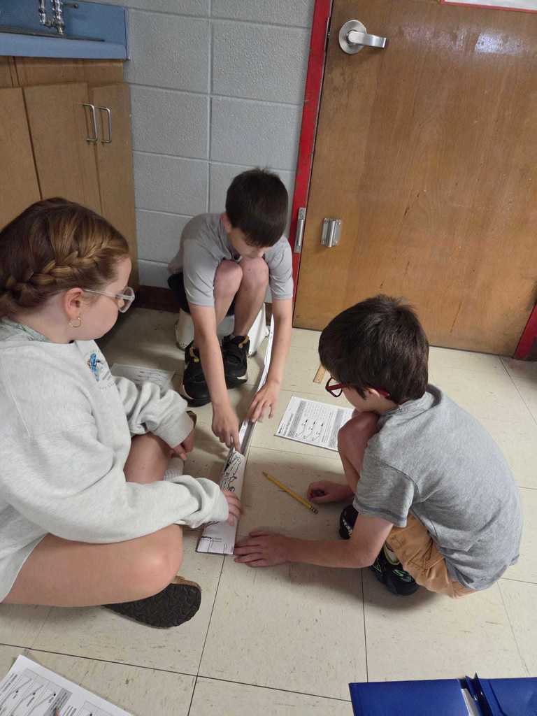 Mrs. Wilson’s 4th grade class turned the classroom into a mini theme park today as students designed and tested their own roller coaster tracks!     The challenge: demonstrate the transfer of energy by releasing a marble at different heights to see how it impacts where the “bumper car” lands.  Warriors discover how energy works in the real world.  ❤️🤍