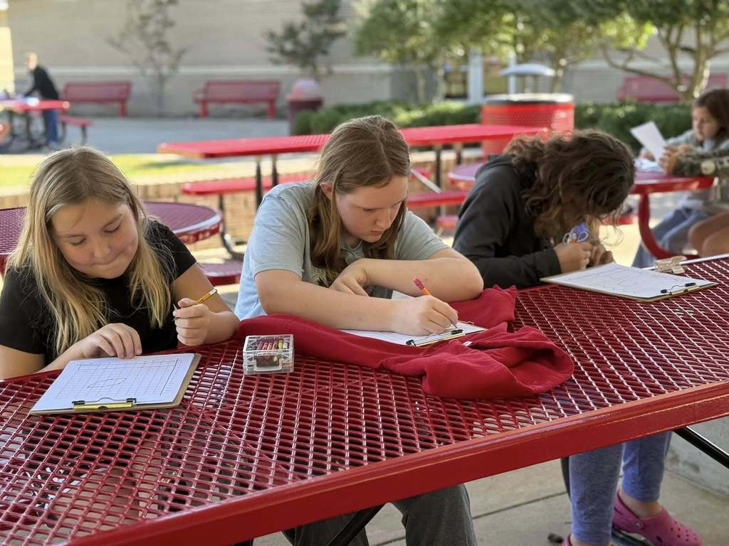 WMS 5th graders have been enjoying the weather outside while learning about coordinate grids!