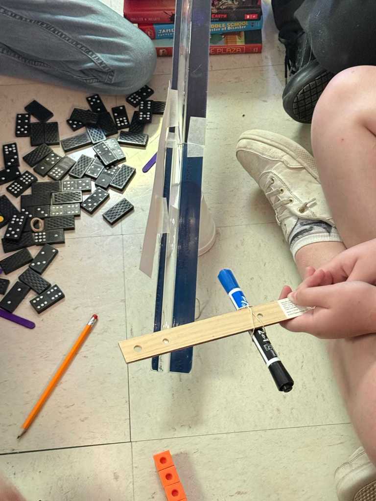 Ms. Cline’s 4th grade science students have been learning all about energy and energy transfer, and today they put their knowledge to the test!   Students worked in teams to design and build chain reaction models using materials from around the classroom. They explored how motion and energy move from one object to another — discovering real-world examples of cause and effect.  Great job, Warriors!  ❤️🤍