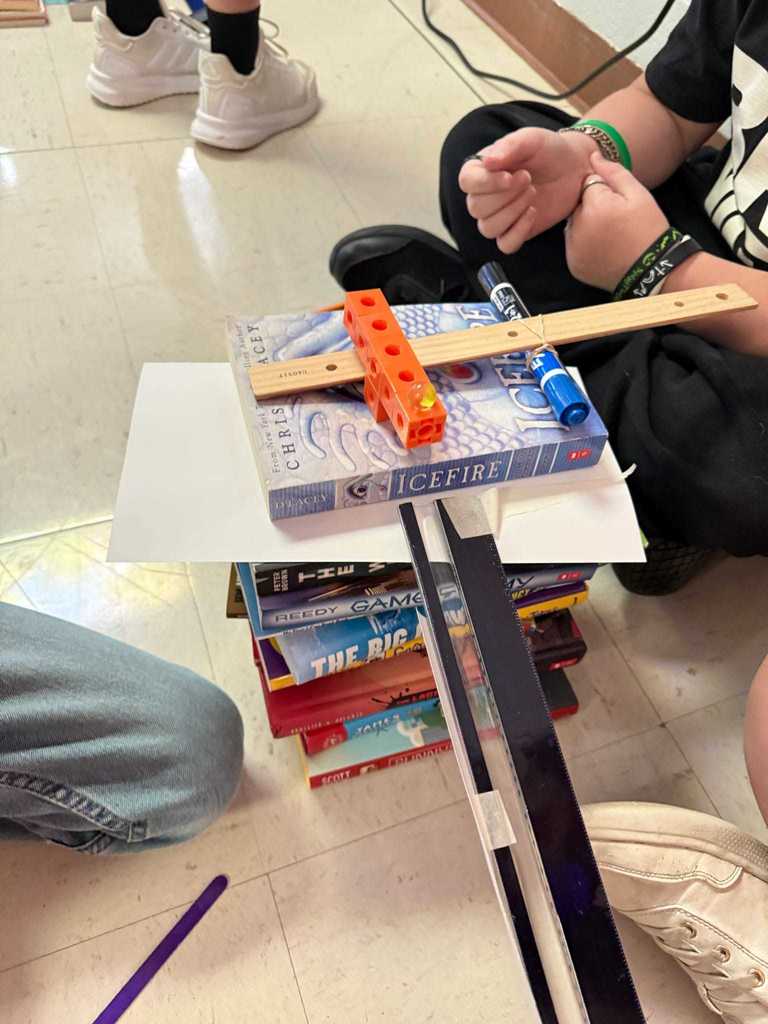 Ms. Cline’s 4th grade science students have been learning all about energy and energy transfer, and today they put their knowledge to the test!   Students worked in teams to design and build chain reaction models using materials from around the classroom. They explored how motion and energy move from one object to another — discovering real-world examples of cause and effect.  Great job, Warriors!  ❤️🤍