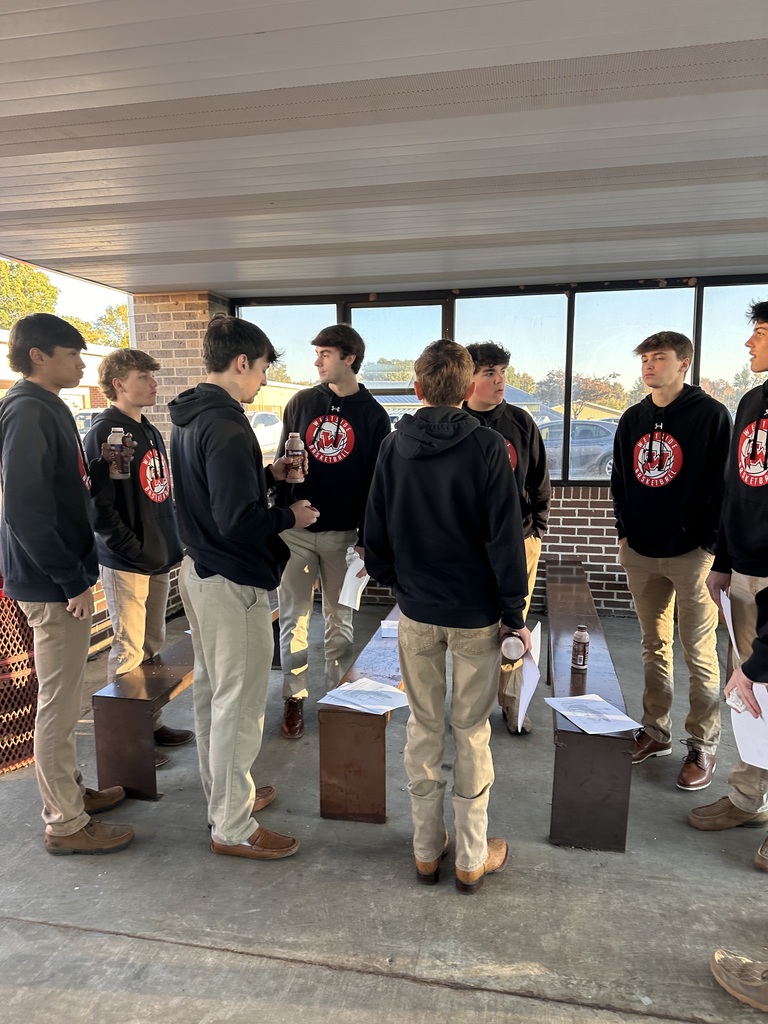 WHS Boys Basketball team brought the spirit to Westside Elementary this morning! 🏀❤️🤍  Players helped open car doors and greeted students with big smiles to start the day, then joined the morning meeting to pump up our Lil Warriors and their families for tonight’s Red & White Game!  Join us for an evening full of fun — BBQ dinner, alumni game, Lil Dribblers performance, and Lil Cheer! Festivities kick off at 5:30 p.m. at WHS.
