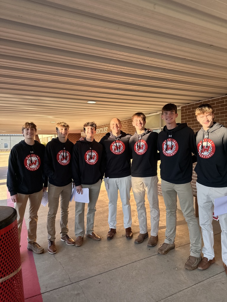 WHS Boys Basketball team brought the spirit to Westside Elementary this morning! 🏀❤️🤍  Players helped open car doors and greeted students with big smiles to start the day, then joined the morning meeting to pump up our Lil Warriors and their families for tonight’s Red & White Game!  Join us for an evening full of fun — BBQ dinner, alumni game, Lil Dribblers performance, and Lil Cheer! Festivities kick off at 5:30 p.m. at WHS.