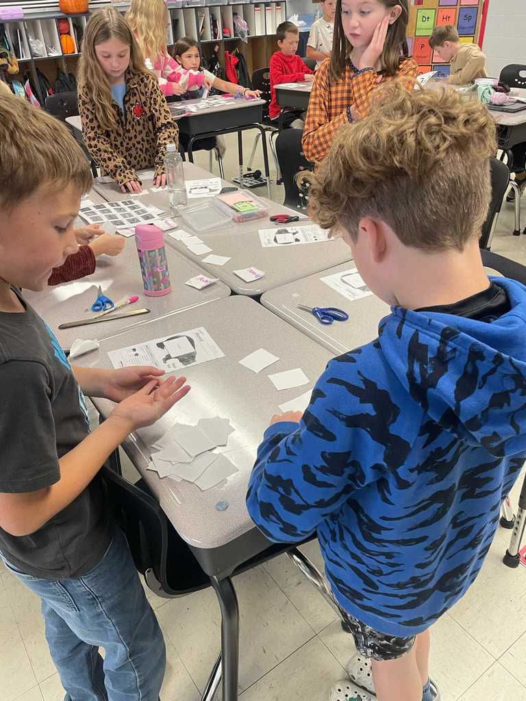 Ms. Russell’s 3rd graders had a “beary” good time today as they worked as brown and black bears.  They played a food-matching game to practice addition and energy concepts — proving that learning can be both fun and meaningful!   Ms. Russell shared that she was amazed by how much fun her students had while learning valuable math and science skills!