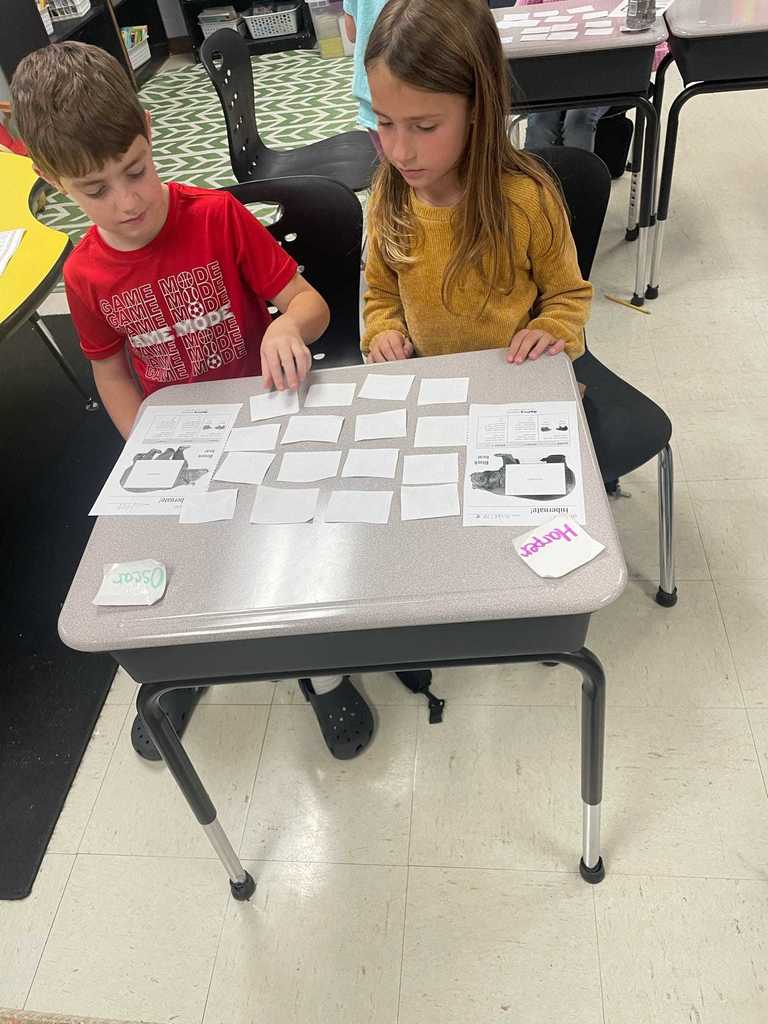 Ms. Russell’s 3rd graders had a “beary” good time today as they worked as brown and black bears.  They played a food-matching game to practice addition and energy concepts — proving that learning can be both fun and meaningful!   Ms. Russell shared that she was amazed by how much fun her students had while learning valuable math and science skills!