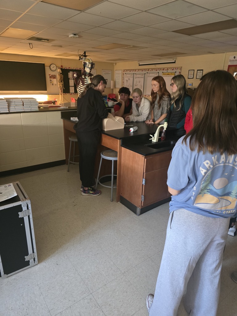 WHS students had an exciting visitor experience in our AP Biology class on Friday, 11/14!  Dr. Barymon from A-State’s Health Studies Department spent the day with our AP Bio students. They had the opportunity to practice using a sonography device to locate fetal structures inside a pregnancy mannequin, and Dr. Barymon shared the many pathways and career options available through A-State’s Health Studies programs.