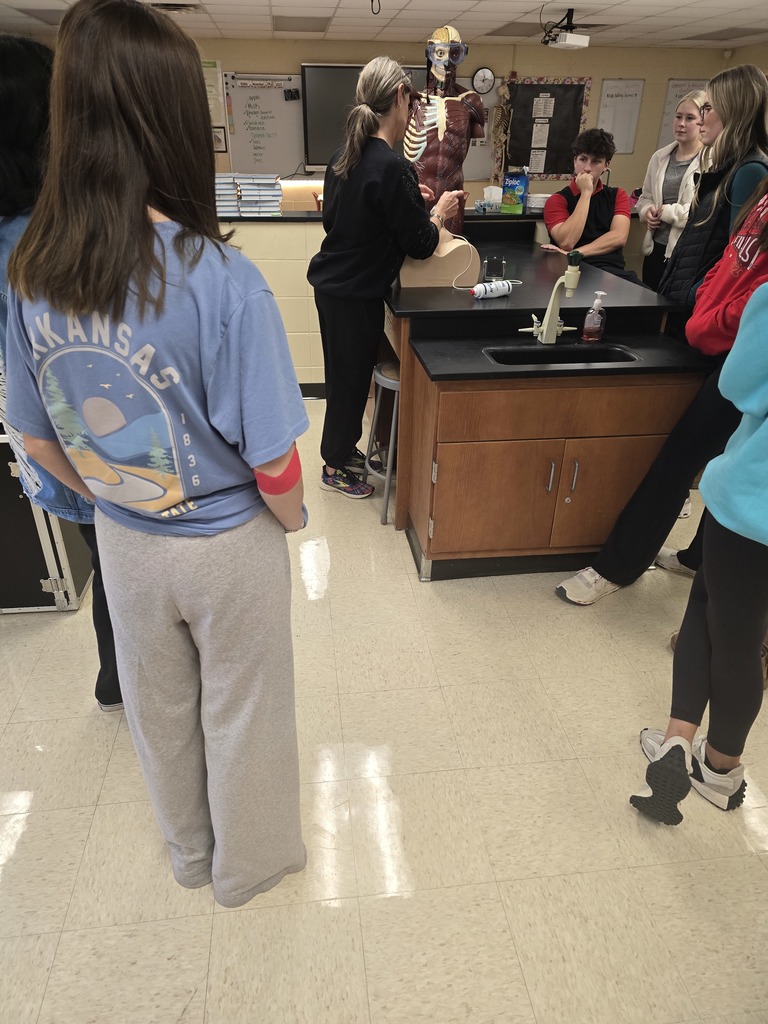 WHS students had an exciting visitor experience in our AP Biology class on Friday, 11/14!  Dr. Barymon from A-State’s Health Studies Department spent the day with our AP Bio students. They had the opportunity to practice using a sonography device to locate fetal structures inside a pregnancy mannequin, and Dr. Barymon shared the many pathways and career options available through A-State’s Health Studies programs.