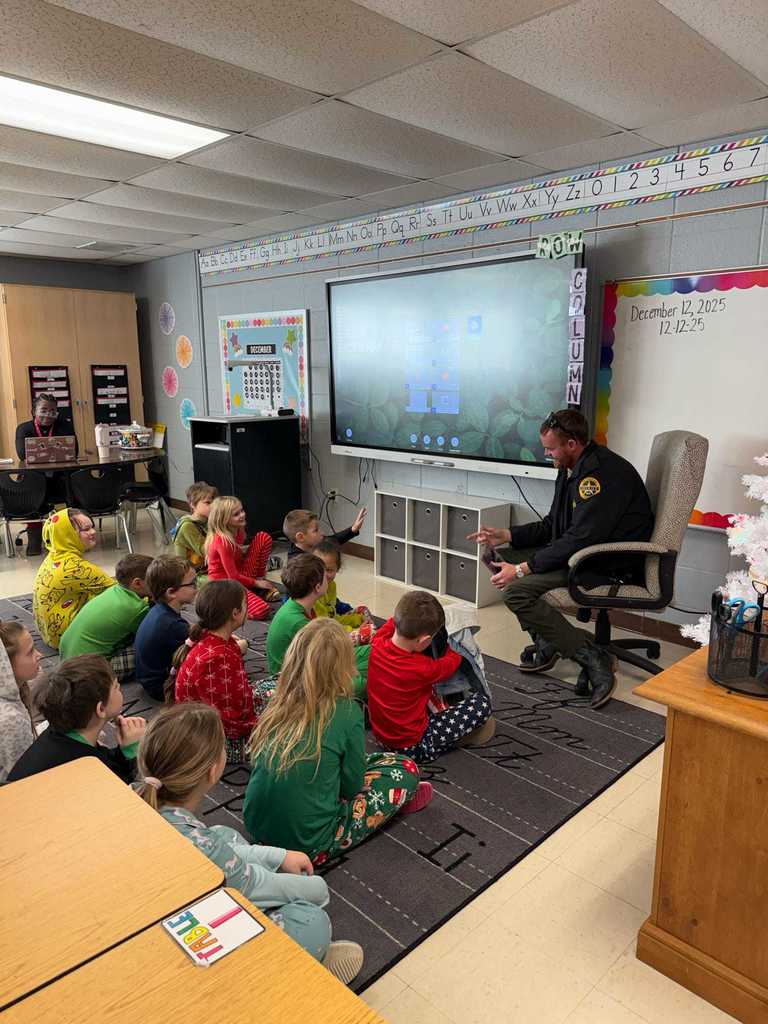 Ms. Copeland’s second grade class had a very special visitor today! Craighead County Deputy Aaron Chadwick stopped by to read The Polar Express for our Polar Express Day. The students were thrilled, and we are so grateful to Deputy Chadwick for making their morning magical!   After the story, the fun continued with a showing of The Polar Express, hot chocolate, popcorn, and—of course—pajama day at WES!  ❤️🤍🙌🙌