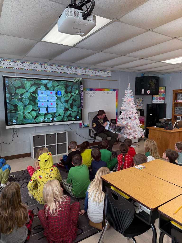 Ms. Copeland’s second grade class had a very special visitor today! Craighead County Deputy Aaron Chadwick stopped by to read The Polar Express for our Polar Express Day. The students were thrilled, and we are so grateful to Deputy Chadwick for making their morning magical!   After the story, the fun continued with a showing of The Polar Express, hot chocolate, popcorn, and—of course—pajama day at WES!  ❤️🤍🙌🙌