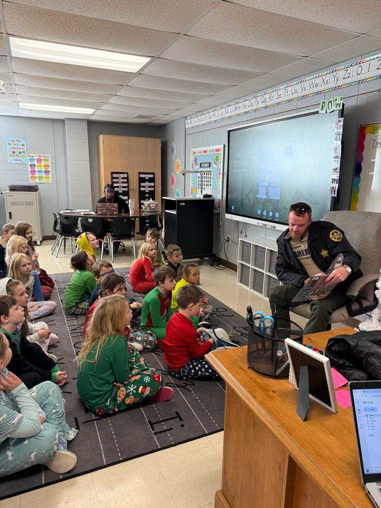 Ms. Copeland’s second grade class had a very special visitor today! Craighead County Deputy Aaron Chadwick stopped by to read The Polar Express for our Polar Express Day. The students were thrilled, and we are so grateful to Deputy Chadwick for making their morning magical!   After the story, the fun continued with a showing of The Polar Express, hot chocolate, popcorn, and—of course—pajama day at WES!  ❤️🤍🙌🙌