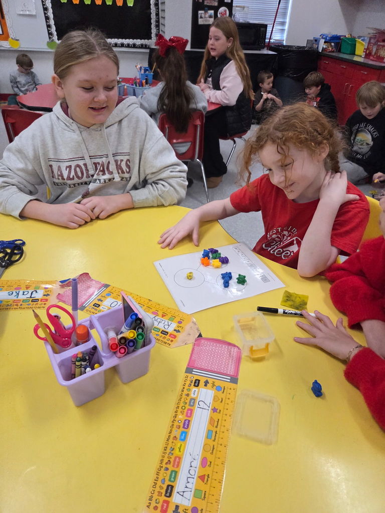 At Westside Elementary this morning, Mrs. Wilson’s 4th grade class visited Mrs. Ally’s kindergarten class to kick off something special! Kindergarten students are beginning to learn about addition and part-part-whole, and our 4th graders were excited to help support their learning.  This is the start of a collaboration between the oldest and youngest students in the building—encouraging our 4th graders to step into leadership roles while giving our kindergarteners a fun and encouraging learning experience.  Mrs. Ally and Mrs. Wilson are doing a wonderful job building a true community of collaborators! ⭐️