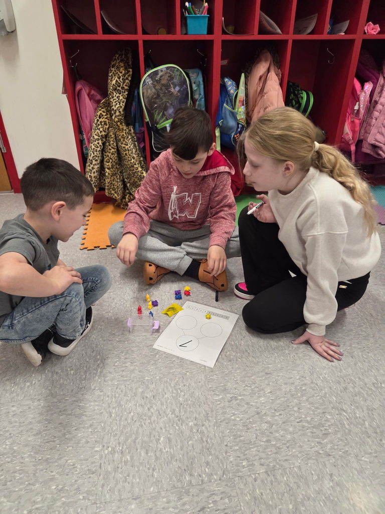 At Westside Elementary this morning, Mrs. Wilson’s 4th grade class visited Mrs. Ally’s kindergarten class to kick off something special! Kindergarten students are beginning to learn about addition and part-part-whole, and our 4th graders were excited to help support their learning.  This is the start of a collaboration between the oldest and youngest students in the building—encouraging our 4th graders to step into leadership roles while giving our kindergarteners a fun and encouraging learning experience.  Mrs. Ally and Mrs. Wilson are doing a wonderful job building a true community of collaborators! ⭐️