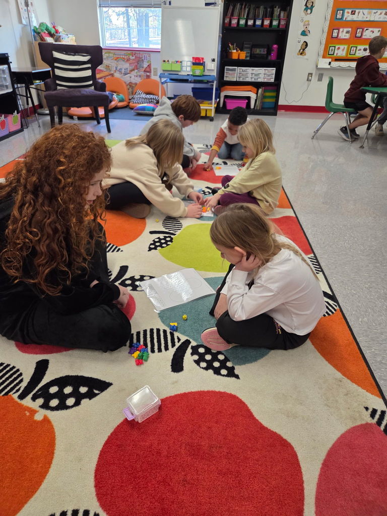 At Westside Elementary this morning, Mrs. Wilson’s 4th grade class visited Mrs. Ally’s kindergarten class to kick off something special! Kindergarten students are beginning to learn about addition and part-part-whole, and our 4th graders were excited to help support their learning.  This is the start of a collaboration between the oldest and youngest students in the building—encouraging our 4th graders to step into leadership roles while giving our kindergarteners a fun and encouraging learning experience.  Mrs. Ally and Mrs. Wilson are doing a wonderful job building a true community of collaborators! ⭐️