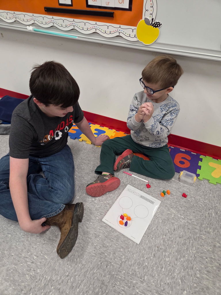 At Westside Elementary this morning, Mrs. Wilson’s 4th grade class visited Mrs. Ally’s kindergarten class to kick off something special! Kindergarten students are beginning to learn about addition and part-part-whole, and our 4th graders were excited to help support their learning.  This is the start of a collaboration between the oldest and youngest students in the building—encouraging our 4th graders to step into leadership roles while giving our kindergarteners a fun and encouraging learning experience.  Mrs. Ally and Mrs. Wilson are doing a wonderful job building a true community of collaborators! ⭐️