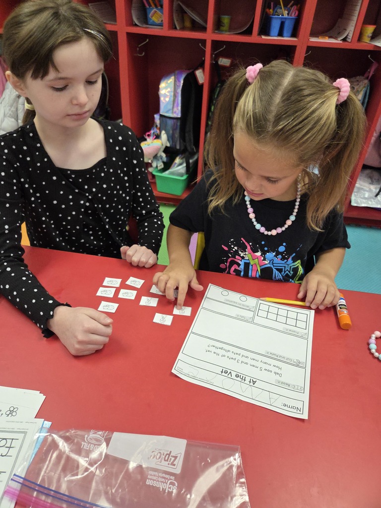 Mrs. Ally and Mrs. Wilson’s classes collaborated again today! Fourth grade students brought word problems to share with the kindergarten classes and helped guide them through solving using strategies such as tally marks, writing equations, and drawing pictures. After completing their work, students were treated to a fun science surprise! They dropped “mystery globs” into an unknown liquid and watched as they dissolved—revealing Mario coins and jewels inside. Great collaboration and hands-on learning happening at Westside! ❤️🤍