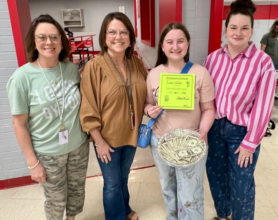 Each year for Pi Day, the Westside High School Math department hosts a competition among all our students to see who can recite the most digits of the irrational number Pi (3.1415…). It is announced in advance that the winner will receive $1 for each digit they can recite. The award this year goes to…..Ms. Emma Waller (Grade 10), who recited 171 digits of Pi. Congrats on your $171, Emma!