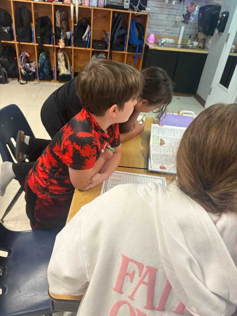Ms. Shannon Cox’s fourth graders are working in station groups to review previously taught skills, including alphabetical order and category word sorts.  Students are collaborating with their classmates and taking ownership of their learning by checking their own work with an answer key. What a great way to build both skills and independence! ❤️🤍