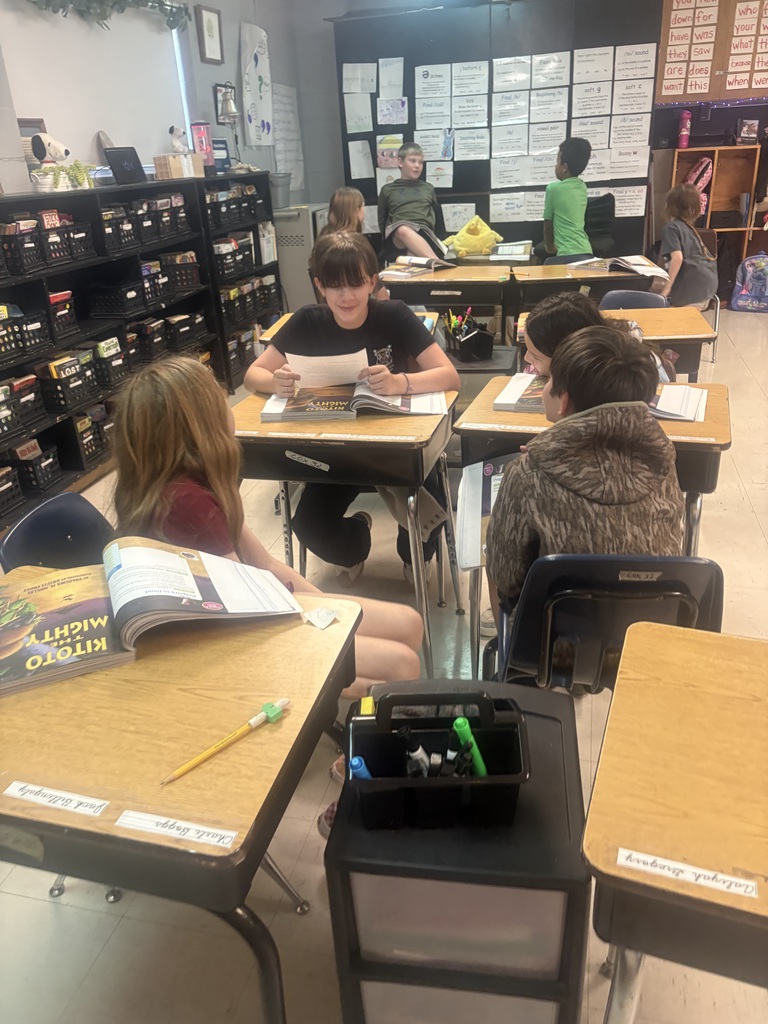 Mrs. Shannon Cox’s fourth-grade students are putting their reading skills to work through literature groups! Each student takes on a specific role—leader, timekeeper, investigator, or reporter—as they work together to reread a text and answer both explicit and inferential questions using evidence from their reading. Along the way, they’re strengthening reading comprehension, communication, and teamwork skills! Warriors putting learning into action! ❤️🤍