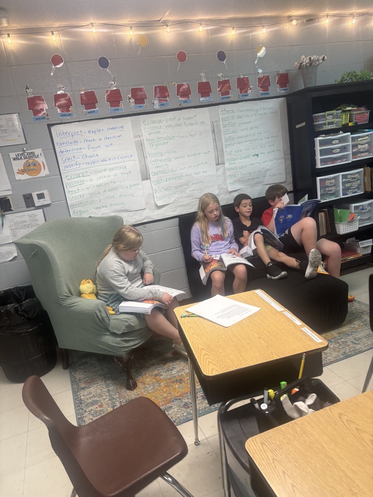 Mrs. Shannon Cox’s fourth-grade students are putting their reading skills to work through literature groups! Each student takes on a specific role—leader, timekeeper, investigator, or reporter—as they work together to reread a text and answer both explicit and inferential questions using evidence from their reading. Along the way, they’re strengthening reading comprehension, communication, and teamwork skills! Warriors putting learning into action! ❤️🤍