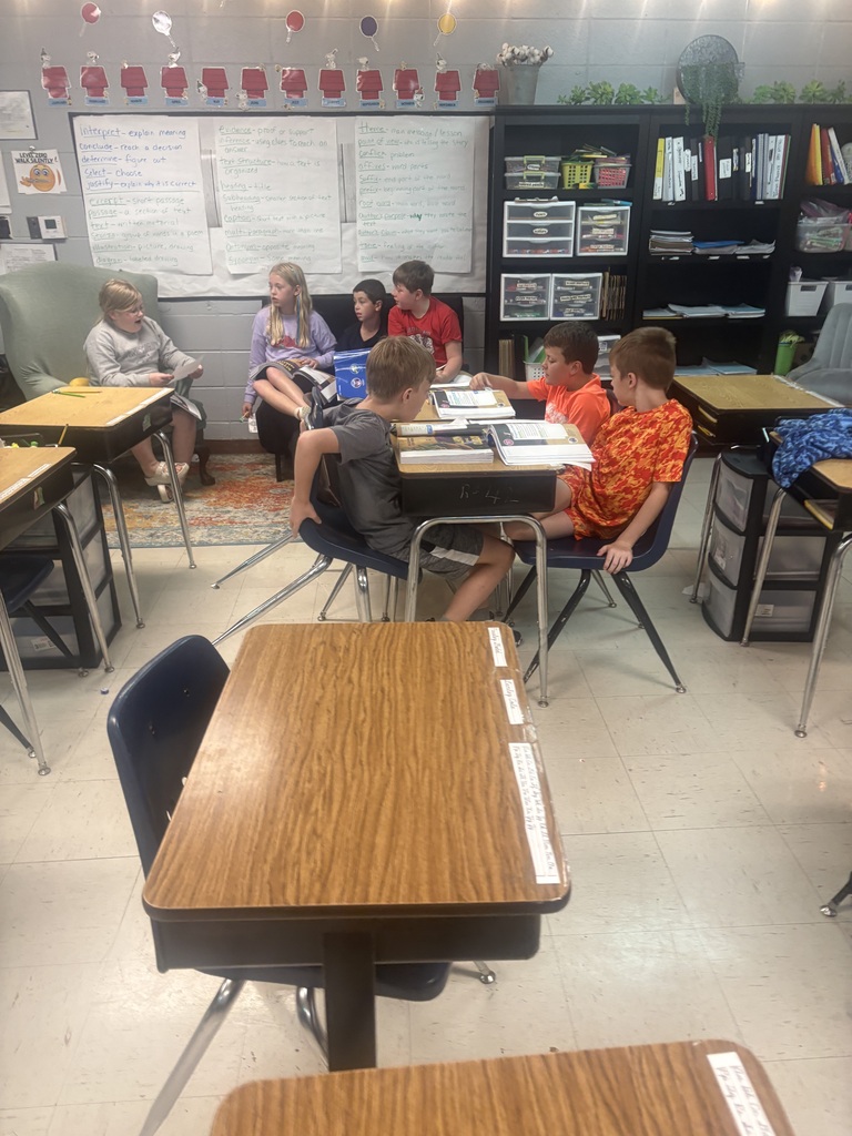 Mrs. Shannon Cox’s fourth-grade students are putting their reading skills to work through literature groups! Each student takes on a specific role—leader, timekeeper, investigator, or reporter—as they work together to reread a text and answer both explicit and inferential questions using evidence from their reading. Along the way, they’re strengthening reading comprehension, communication, and teamwork skills! Warriors putting learning into action! ❤️🤍