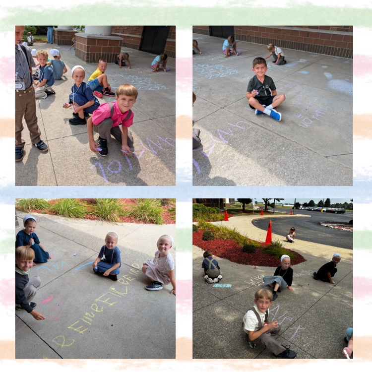 KC and kb students drawing with sidewalk chalk