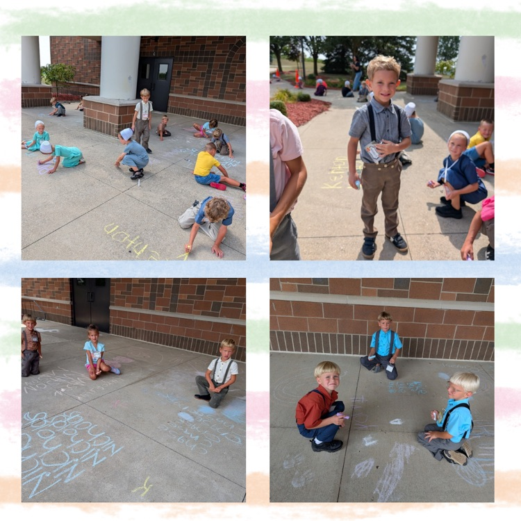 KC and kb students drawing with sidewalk chalk