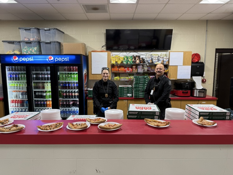 Officers Conwell and Flowers providing papa John’s pizza