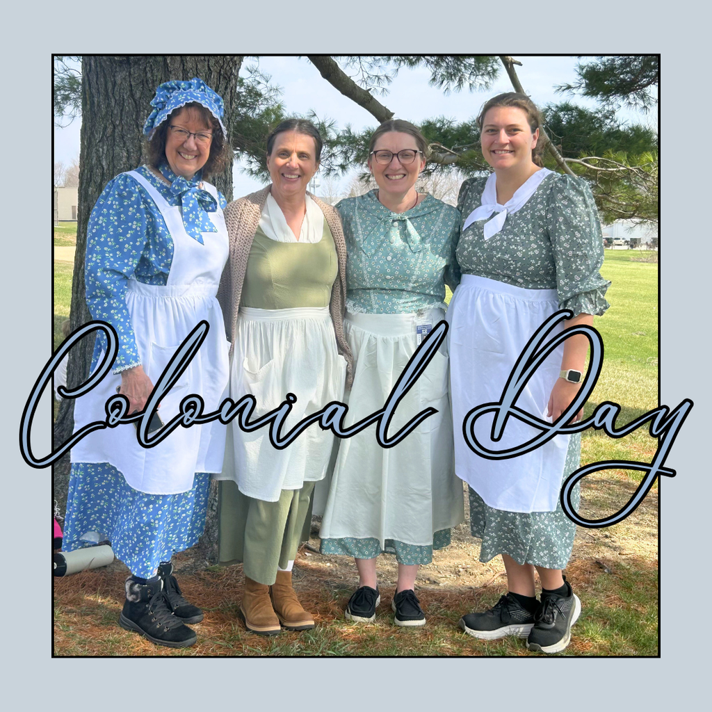 1st grade dressed in colonial attire and playing games