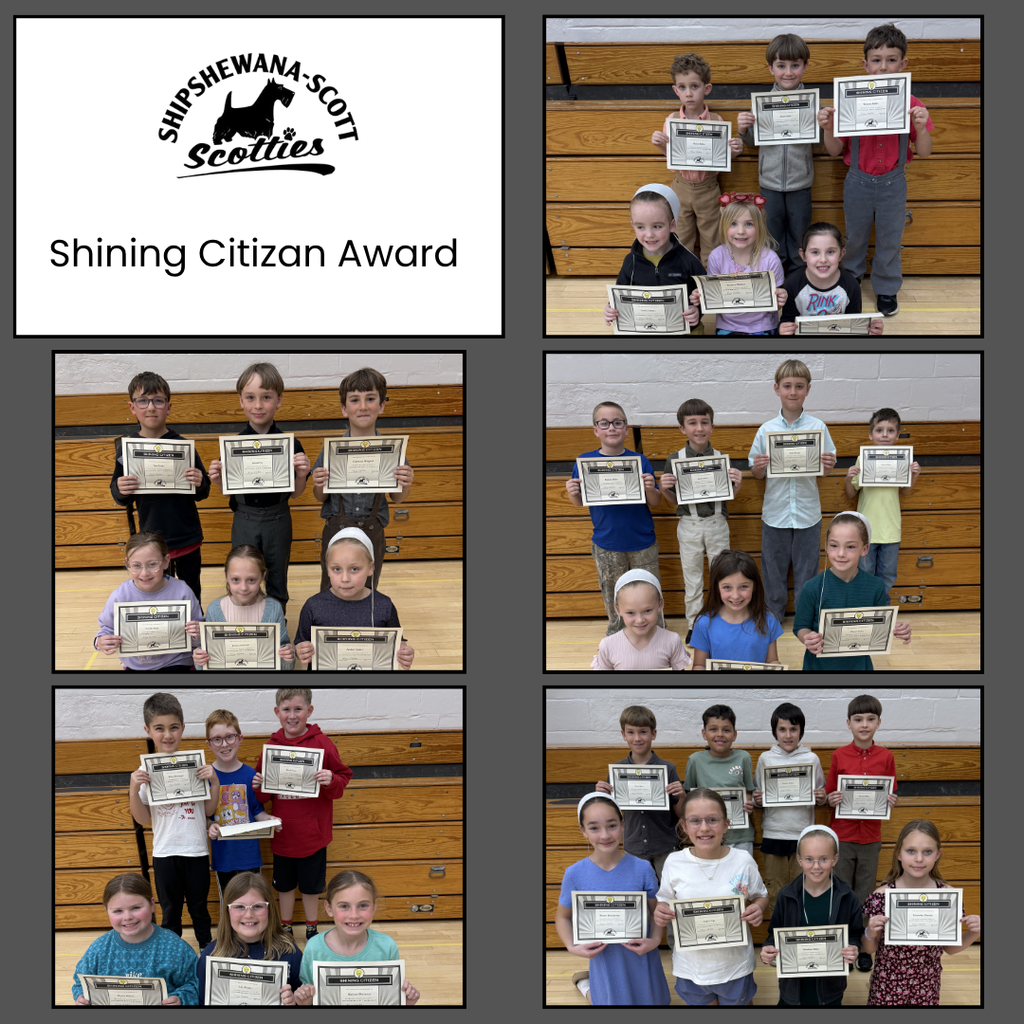 students holding their awards